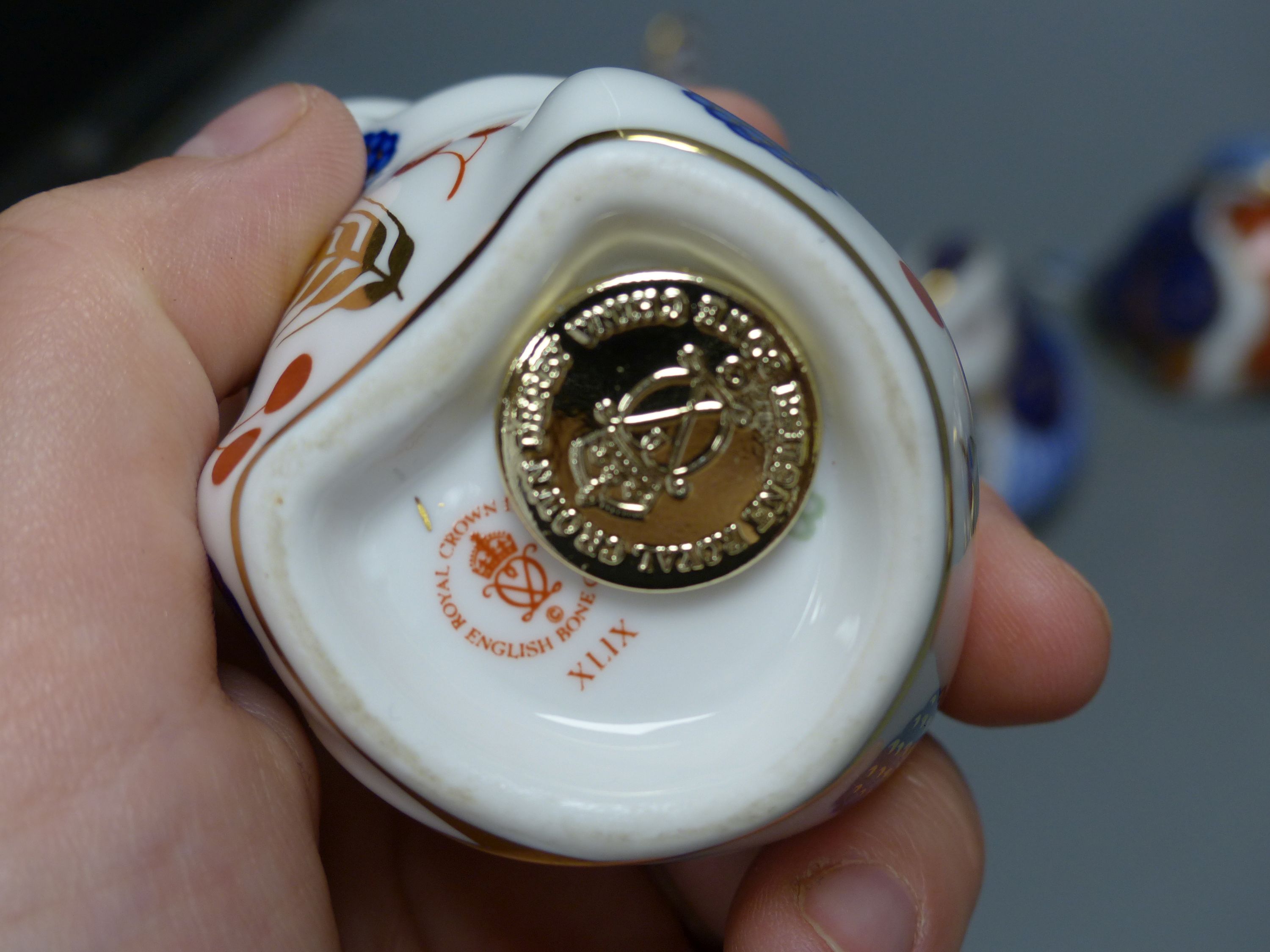 Eight Royal Crown Derby animal or bird paperweights